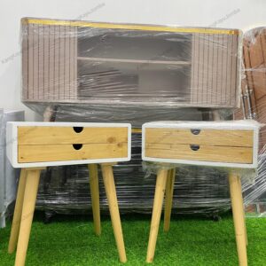 Nakas Album Jati Belanda minimalis 2 laci warna cerah lembut Meja nakas kayu jati belanda untuk kamar tidur minimalis Nakas serbaguna 2 laci dari jati belanda finishing cat duco Nakas minimalis jati belanda elegan untuk ruangan modern Nakas jati belanda warna cerah dengan dua laci serbaguna